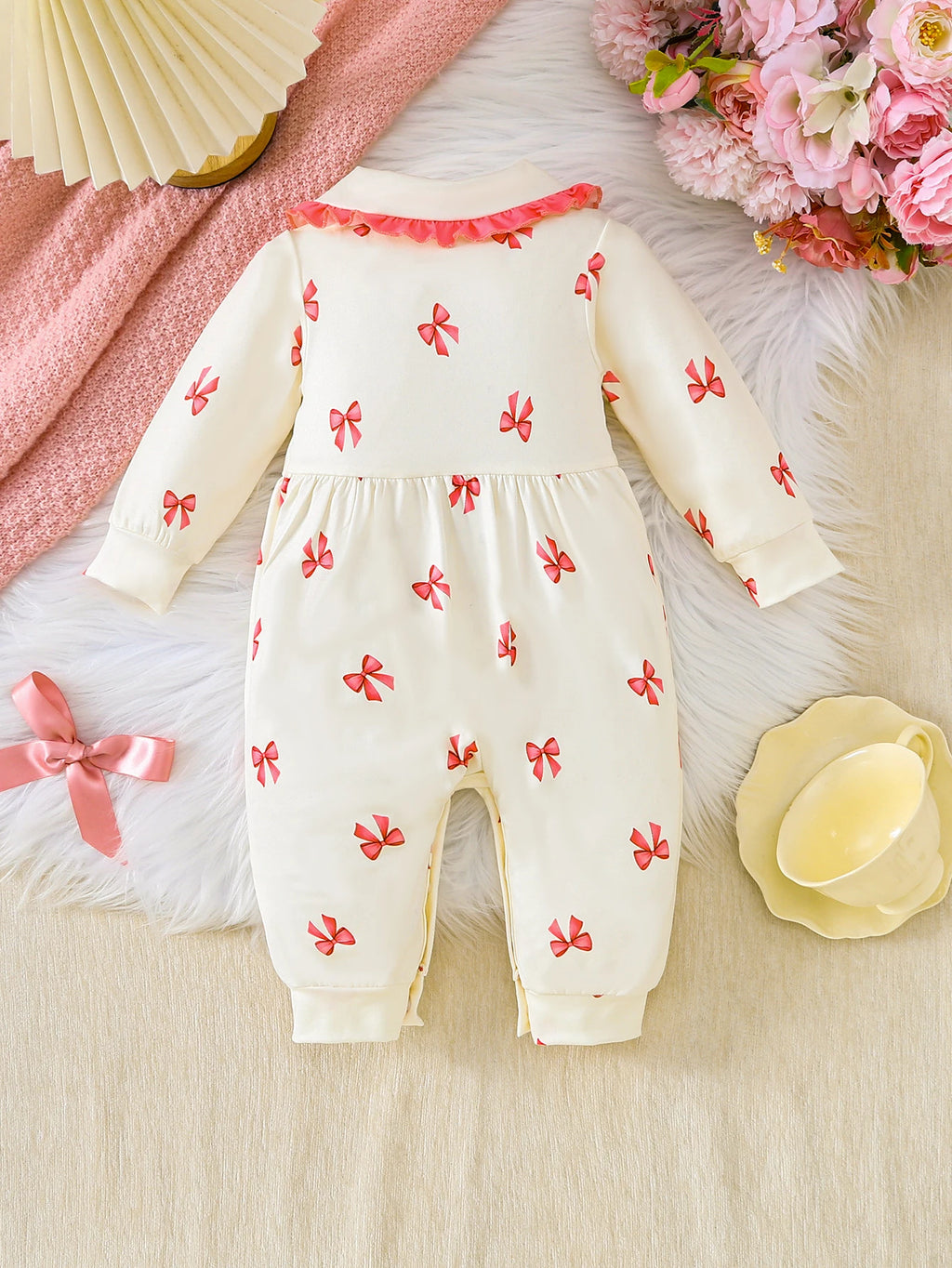 【Baby Girl Bowknot Romper】Autumn & Winter Style: Cream Base with Fuchsia Bowknot Print, featuring a doll collar and large bowkno