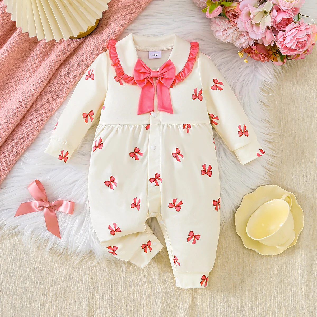 【Baby Girl Bowknot Romper】Autumn & Winter Style: Cream Base with Fuchsia Bowknot Print, featuring a doll collar and large bowkno